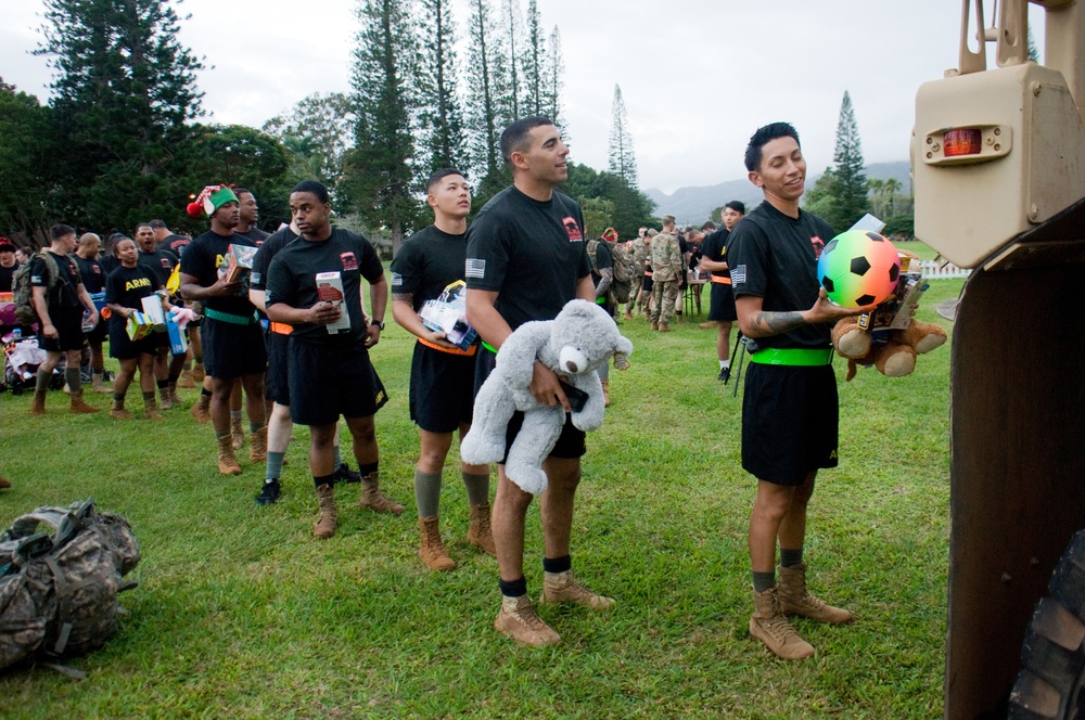 ‘Wolfpack’ holds Christmas ruck for children