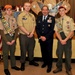 Col. James M. Suhr commends new eagle scouts on a job well done.