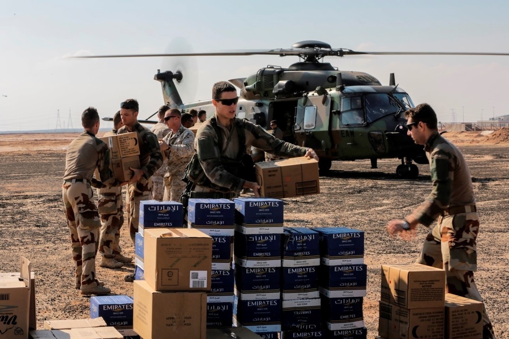 U.S. Marines and French forces conduct a resupply