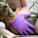 U.S. Navy and U.K. Royal Navy Sailors perform training on a Neil Robertson stretcher aboard Royal Fleet Auxiliary ship Cardigan Bay during exercise Azraq Serpent 18.