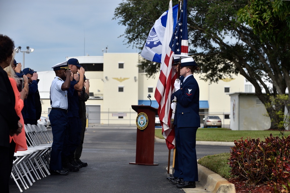 A Coast Guard Air Station Miami color guard presents the colors during a memorial remembrance ceremony
