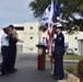 A Coast Guard Air Station Miami color guard presents the colors during a memorial remembrance ceremony