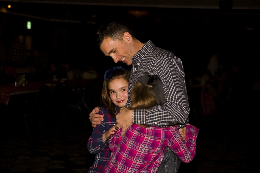 Dads, daughters saddle up to dance night away