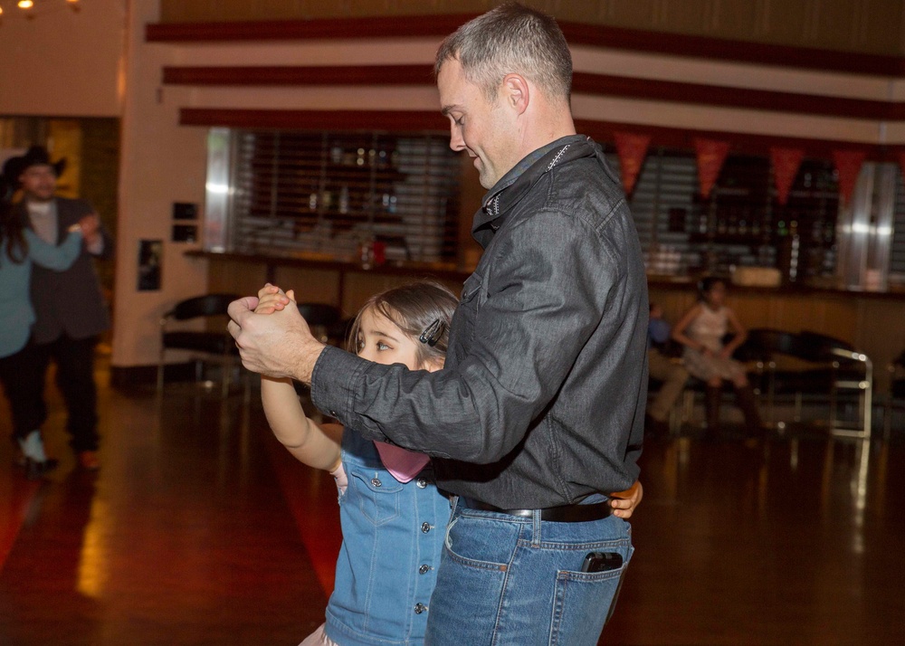 Daddys, daughter saddle up to dance night away