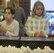 Military families enjoy a Winter Wonderland themed dinner aboard Camp Foster