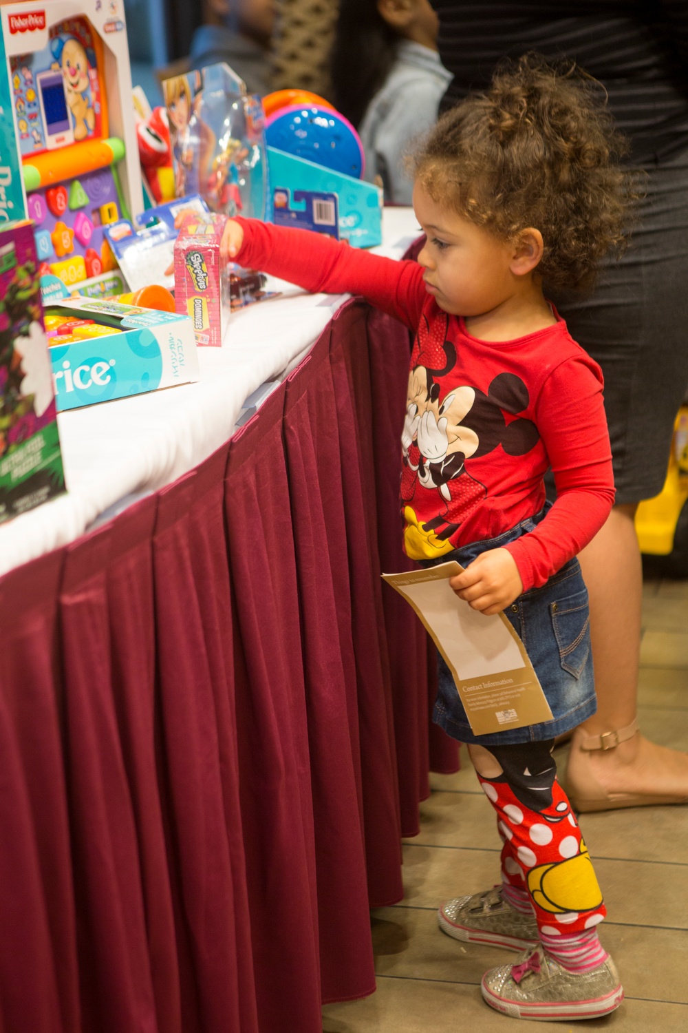 Military families enjoy a Winter Wonderland themed dinner aboard Camp Foster