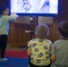 Military families enjoy a Winter Wonderland themed dinner aboard Camp Foster