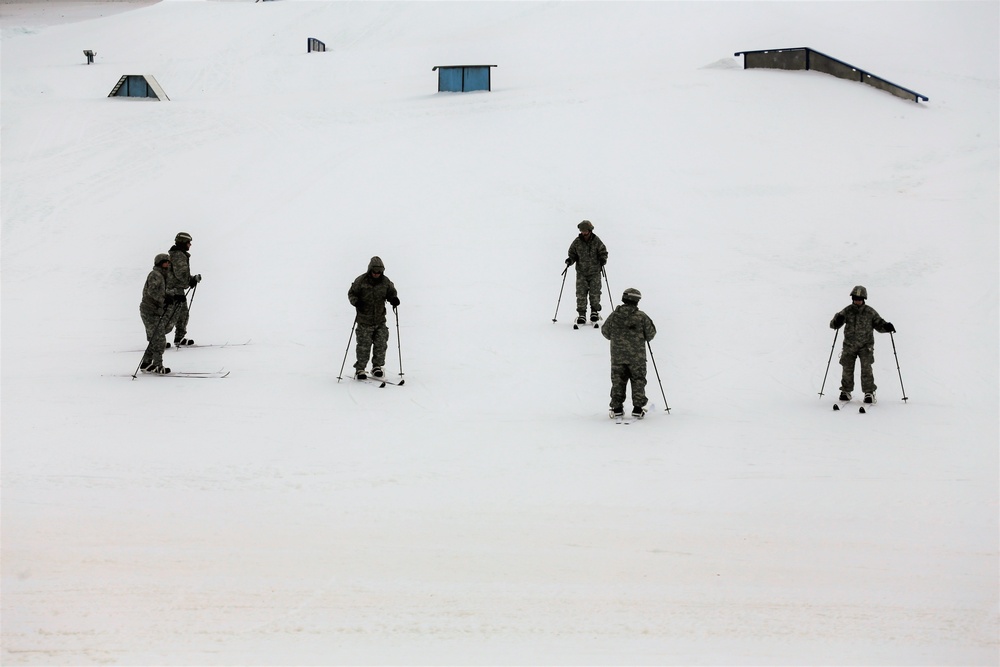 Students learn skiing techniques during Cold-Weather Operations Course at Fort McCoy