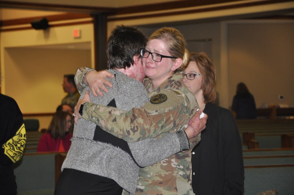 Munson employees embrace workplace violence survivor