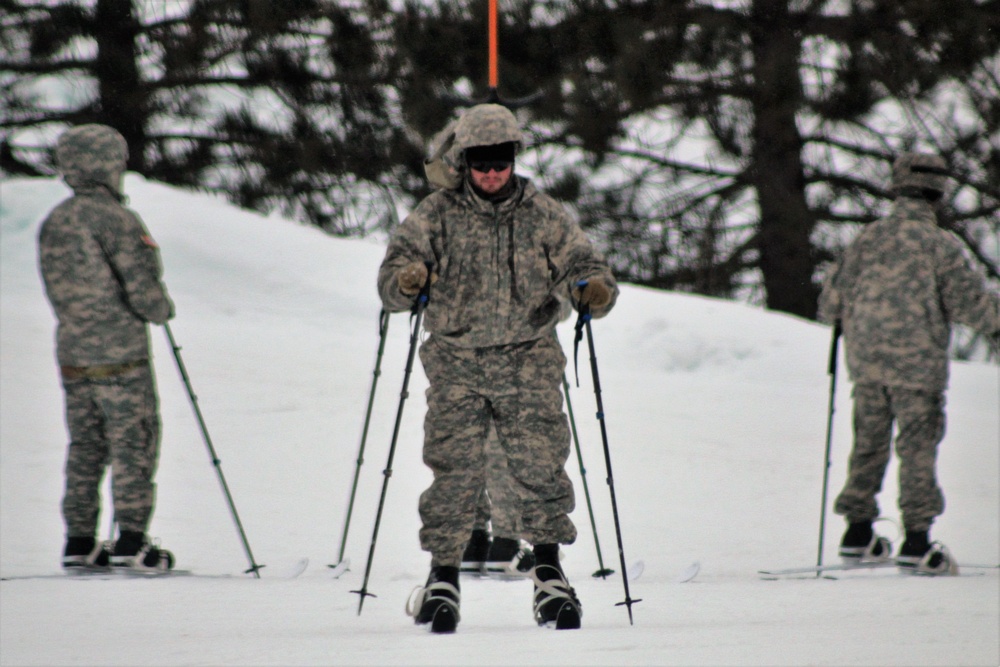 Students learn skiing techniques during Cold-Weather Operations Course at Fort McCoy