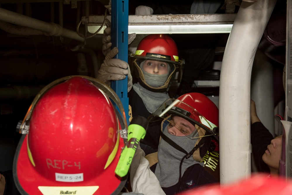 Sailors stop simulated flooding