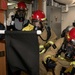 Sailors fight a simulated fire