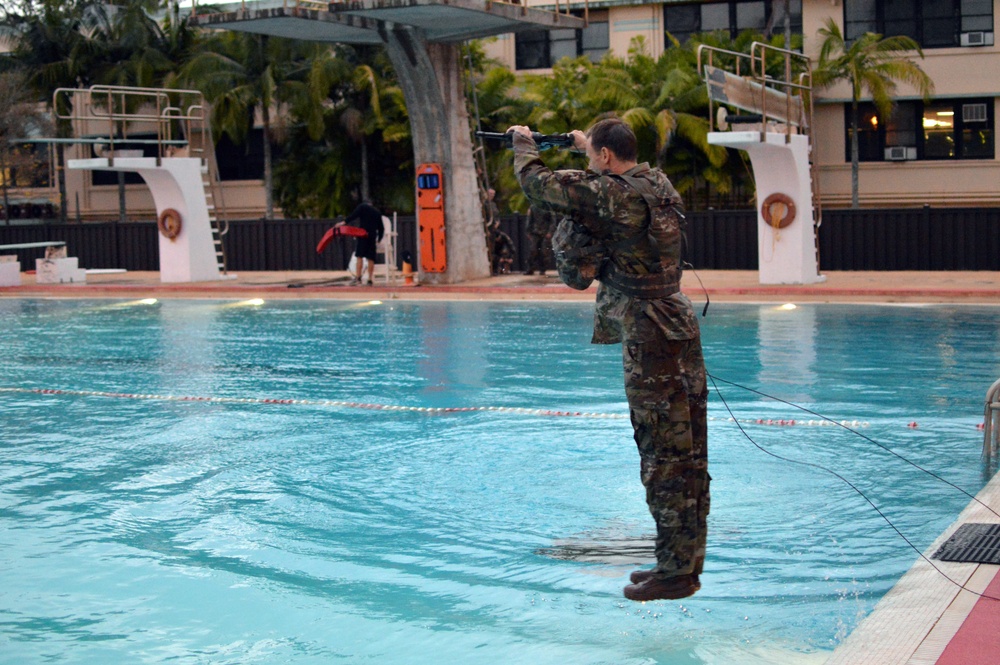 Soldiers perform Combat Water Survival Test