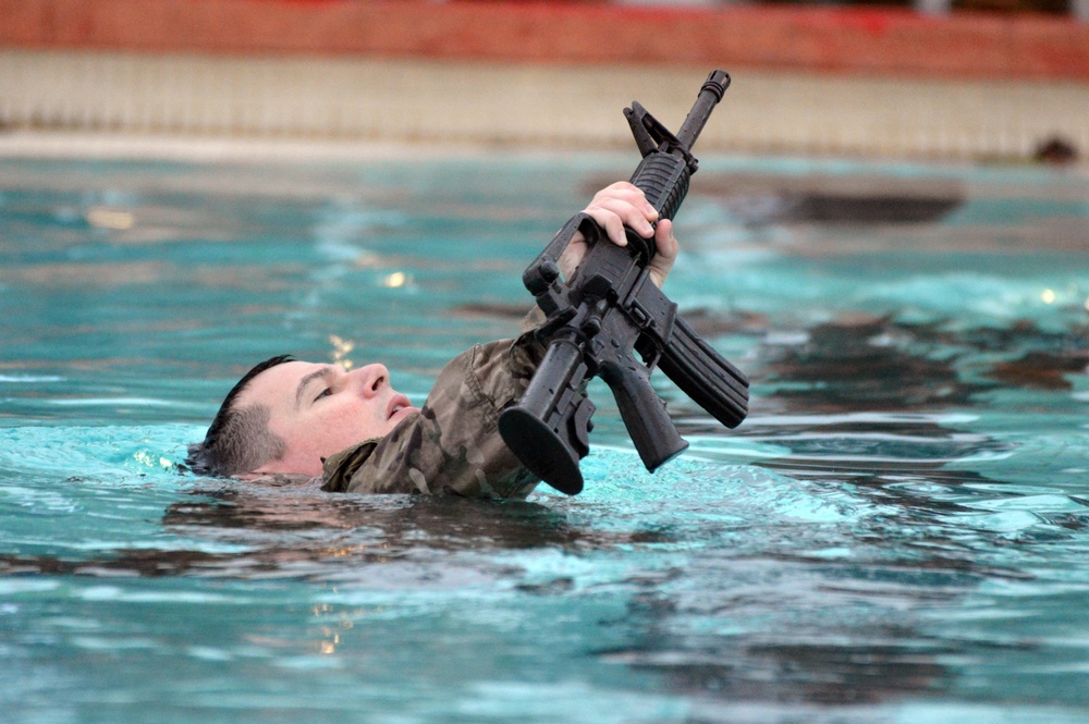 Soldiers perform Combat Water Survival Test