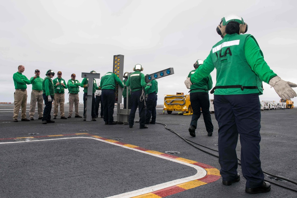 Sailors participate in flight deck drills