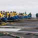 Sailors assember the emergency barricade on the flight deck