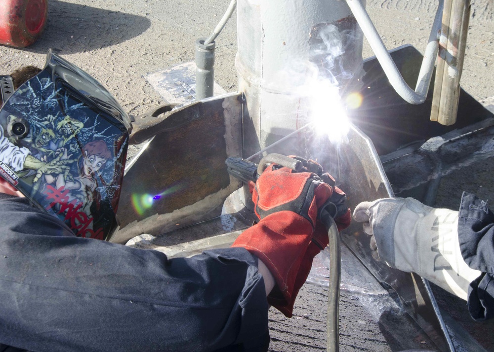 Sailors Repair Frank Cable Crane