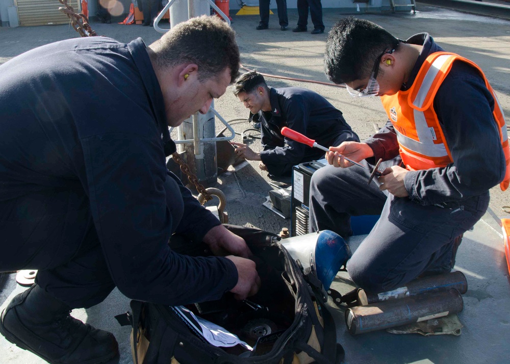 Sailors Repair Frank Cable Crane