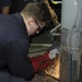 Sailors Repair Frank Cable Crane