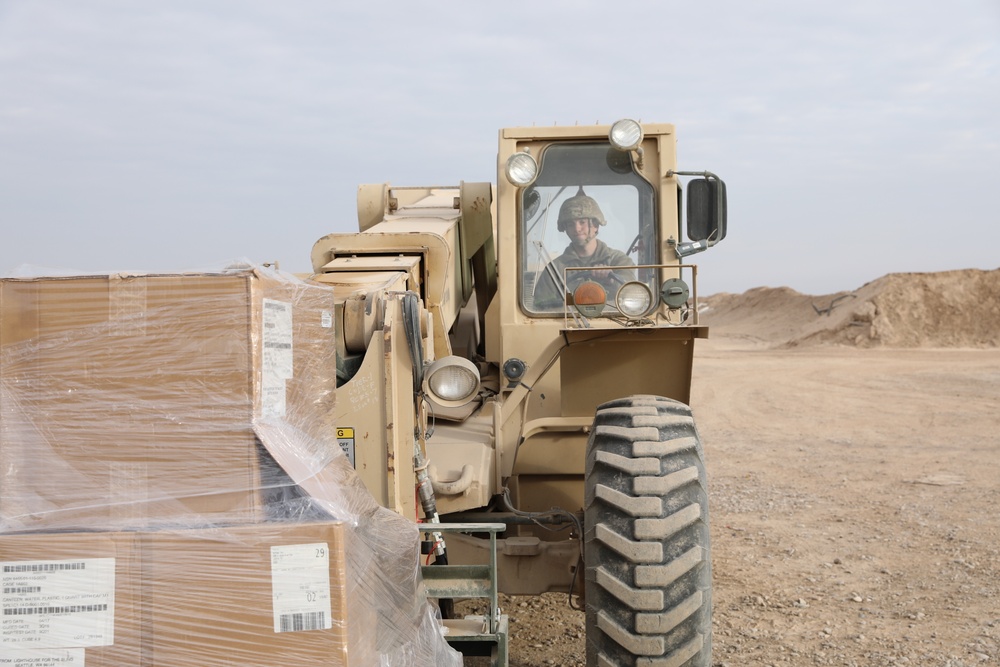 Iraqi Security Forces recieve organizational clothing and individual equipment from Coalition