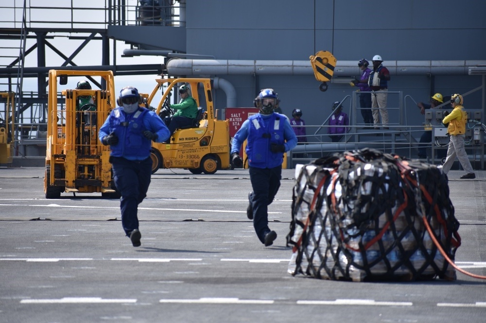 USS Lewis B. Puller conducts hose handling and life raft procedures