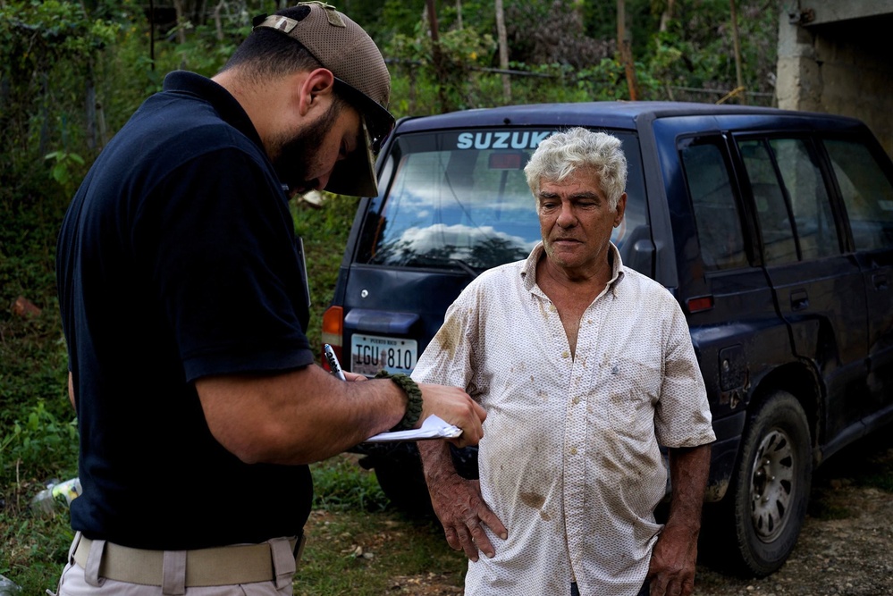 DSA Team Member Assists Survivor in Utuado