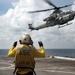 USS San Diego (LPD 22) Airman Directs a AH-1Z Viper Attack Helicopter