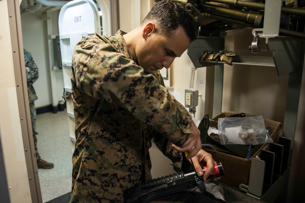 USS San Diego (LPD 22) Marine Conducts Maintenance