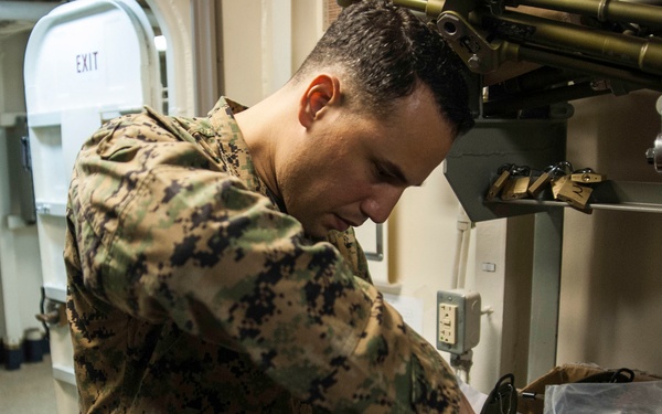 USS San Diego (LPD 22) Marine Conducts Maintenance