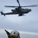 USS San Diego (LPD 22) Airman Directs AH-1Z Viper Attack Helicopter