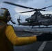 USS San Diego (LPD 22) Airman Directs AH-1Z Viper Attack Helicopter