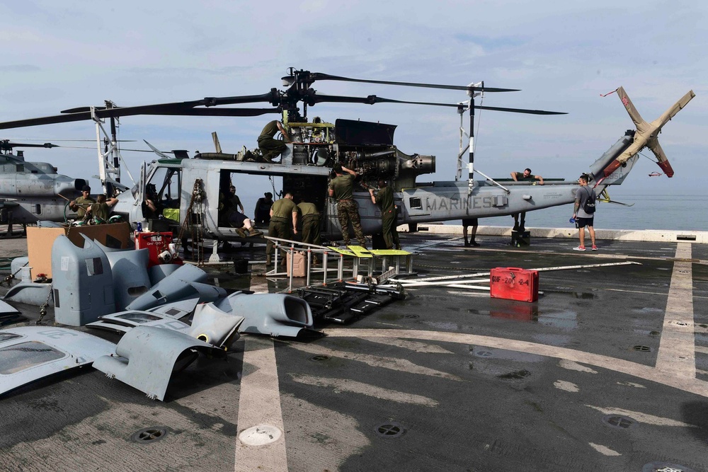 USS San Diego (LPD 22) Marines Take Apart UH-1Y Venom