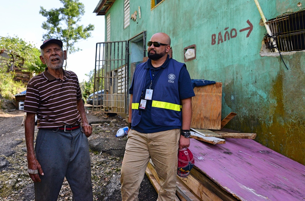Disaster Survivor in Lares Recieves Aid from FEMA DSA