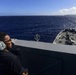 USS San Diego (LPD 22) Operations Specialist Stands Watch on Bridge Wing