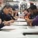 USS America (LHA 6) Sailors take the advancement exam