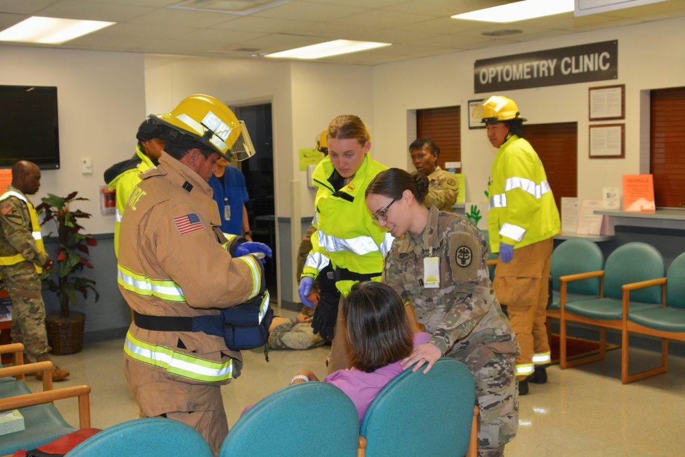 Military Police assist clinic personnel drill for active shooter, real-world emergencies