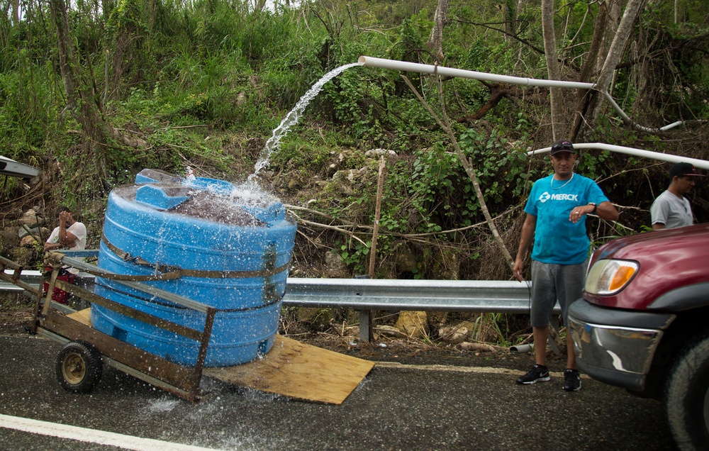 Collecting Water on the Side of the Road