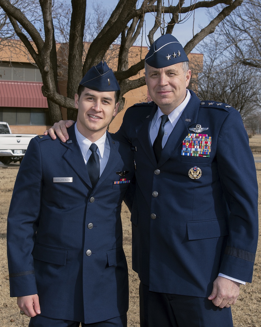 Lt. General Jerry Martinez poses with new Air Force pilot