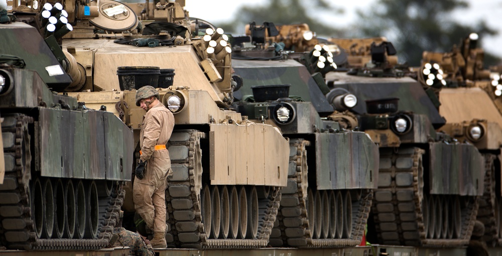 Marines load up tanks, equipment on train for exercise