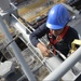 Sailors qualify to work aloft.