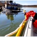 Coast Guard oversees pollution cleanup from submerged tugboat