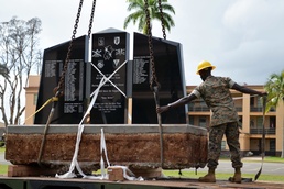 Marine heavy equipment operators move Army memorial
