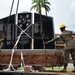 Marine heavy equipment operators move Army memorial