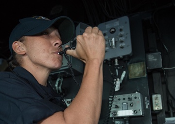 USS Pearl Harbor Sailors stand watch