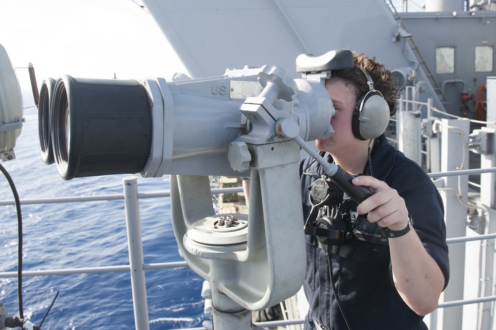 USS America (LHA 6) Sailor stands watch on forward lookout
