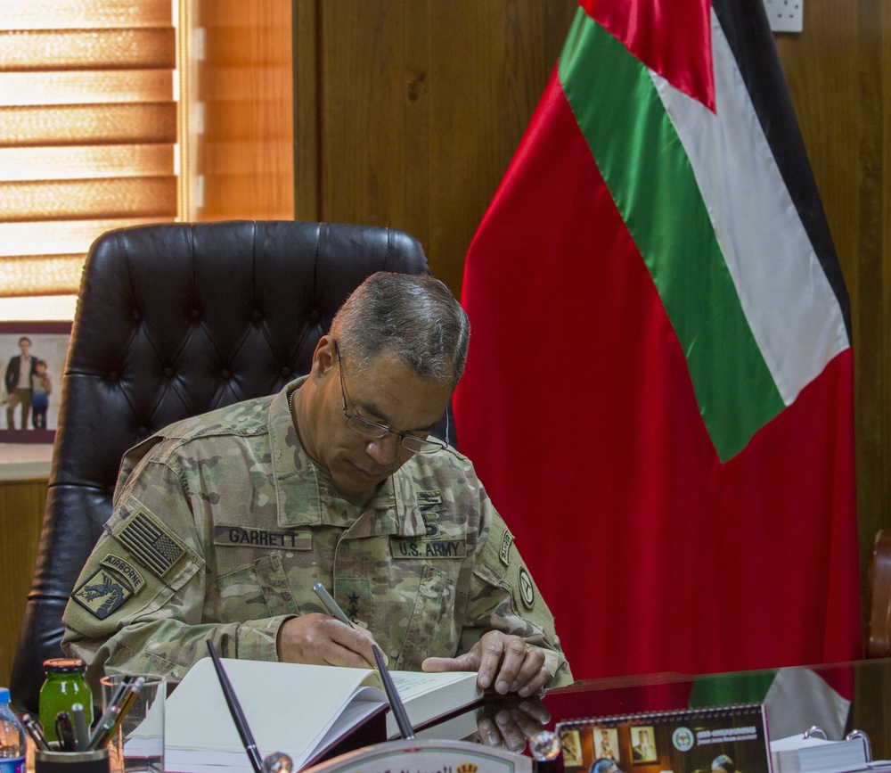 Lt. Gen. Michael Garrett signs Jordan Armed Forces distinguished visitor book