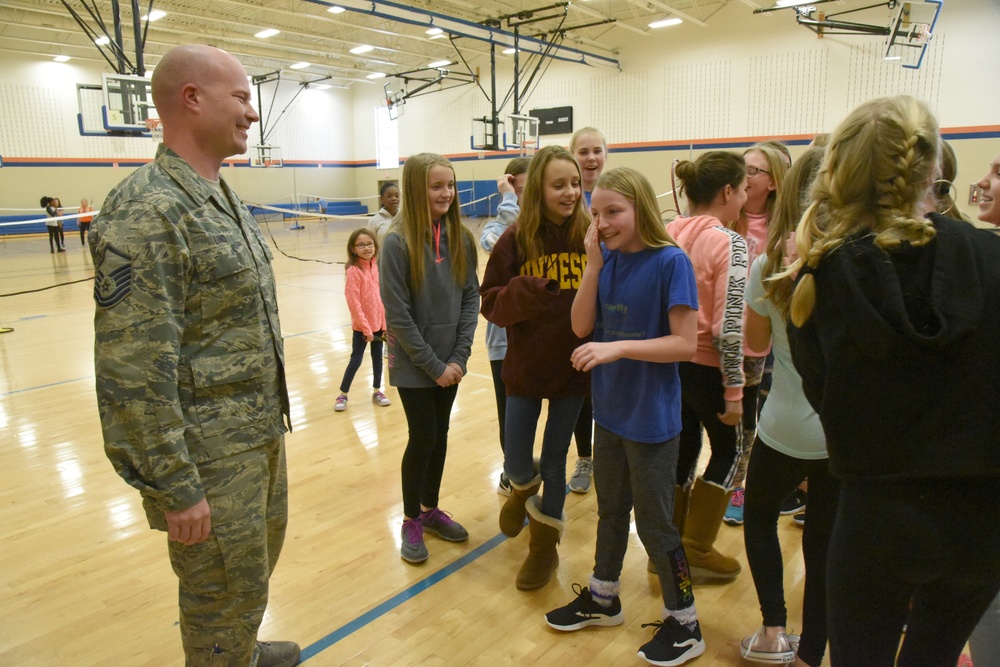 119th Wing member surprises daughters at their schools upon returning from deployment