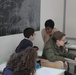 SPMAGTF-CR-AF service members teach English language to Italian students