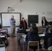 SPMAGTF-CR-AF service members teach English language to Italian students