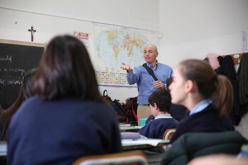 SPMAGTF-CR-AF service members teach English language to Italian students